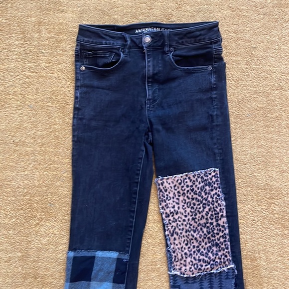 Bespoke patched mid-rise extra stretchy flare washed black denim - Picture 12 of 16